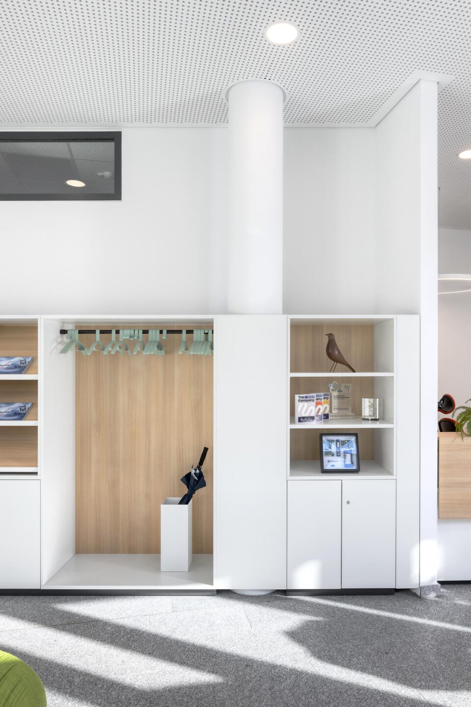 HMS Networks, Karlsruhe | closetspace and shelving near the entrance
